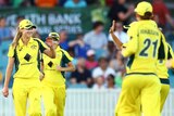 Ellyse Perry is congratulated by Southern Stars team-mates
