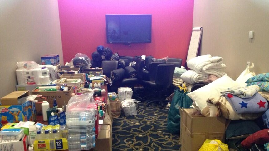 Donations pile up at Springwood evacuation centre in the Blue Mountains.