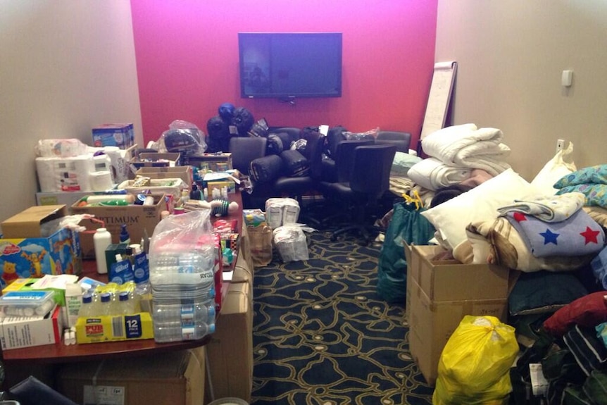Donations pile up at Springwood evacuation centre in the Blue Mountains.