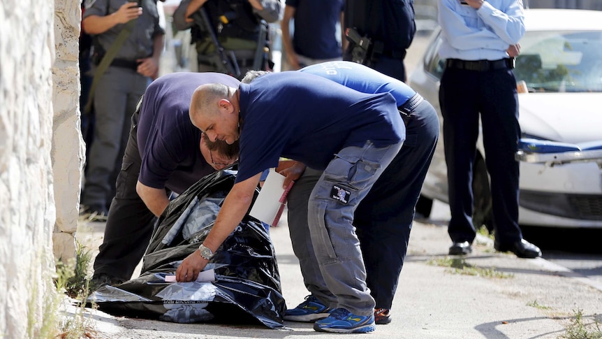 Israeli police check body of Palestinian man shot dead