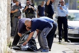 Israeli police check body of Palestinian man shot dead