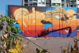 A colourful mural depicting turtles and fish is being painted in the Darwin CBD.