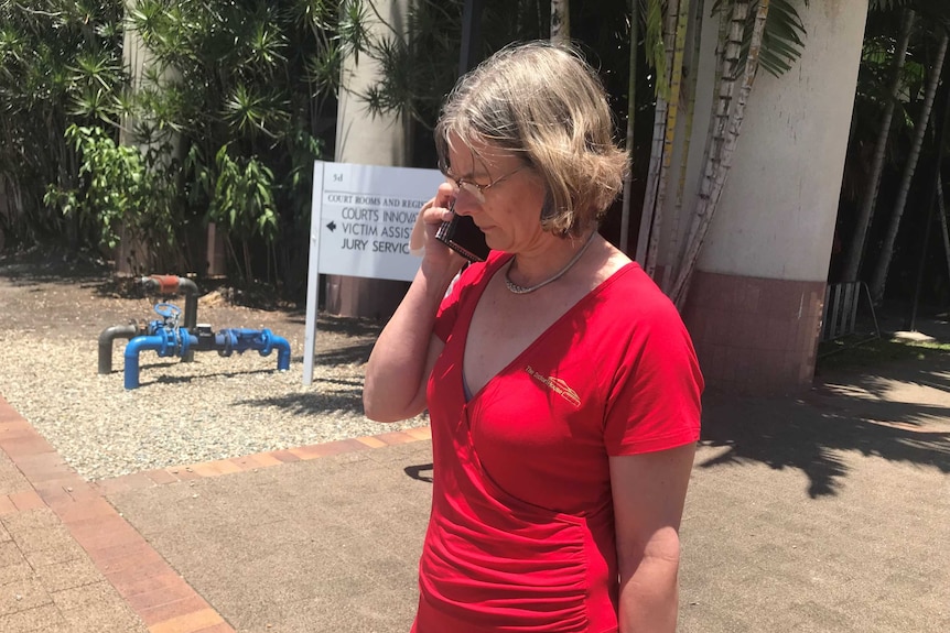 Dr Dianna House on the phone outside a Cairns court.