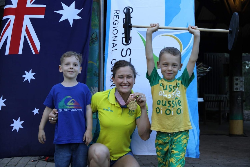 Tia Clair-Toomey welcomed home by kids