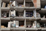 The front of an apartment building left in ruins after the deadly quake.