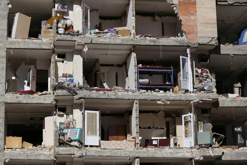 The front of an apartment building left in ruins after the deadly quake.