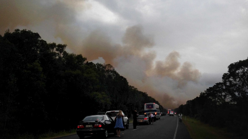 Traffic leading into Lennox Head is halted by bushfire.