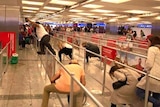 Passengers take cover during Ataturk Airport attack