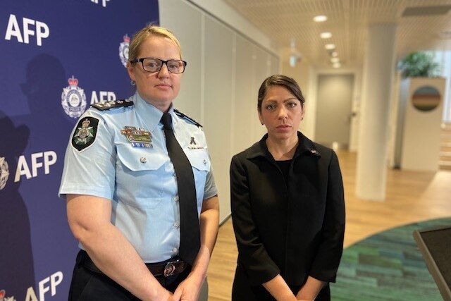 AFP Commander Helen Schneider and Legal Attaché Nitiana Mann from the Federal Bureau of Investigation. 