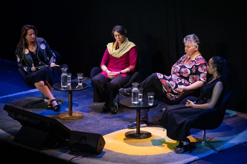 Presenter Larissa Behrendt leads a panel discussion with three other women.