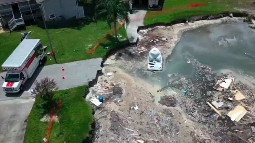 Drone vision shows part of the Florida neighbourhood swallowed by sinkhole