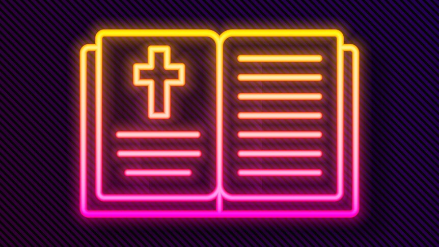 A Bible made of neon tubes with a Christian cross on one of the pages.