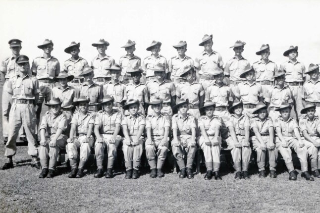 A black and white photo of the Innisfail State High School Cadet Unit in their uniforms.