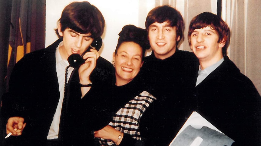 Melbourne radio personality Binny Lum with The Beatles in London in April 1964, ahead of their Australian tour.
