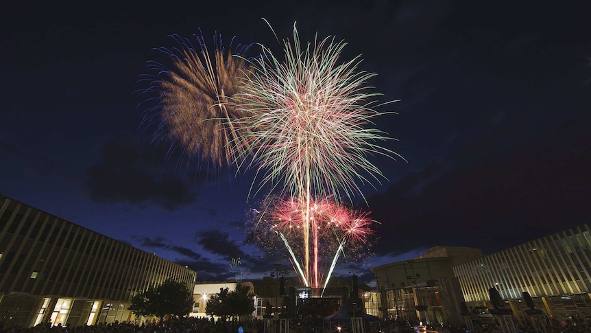 Fireworks fill the sky above the Canberra Theatre in Civic Square