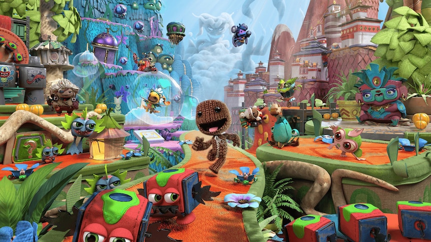 Art from Sackboy: A BIg Adventure, featuring a knitted doll in a colourful setting surrounded by many fun characters