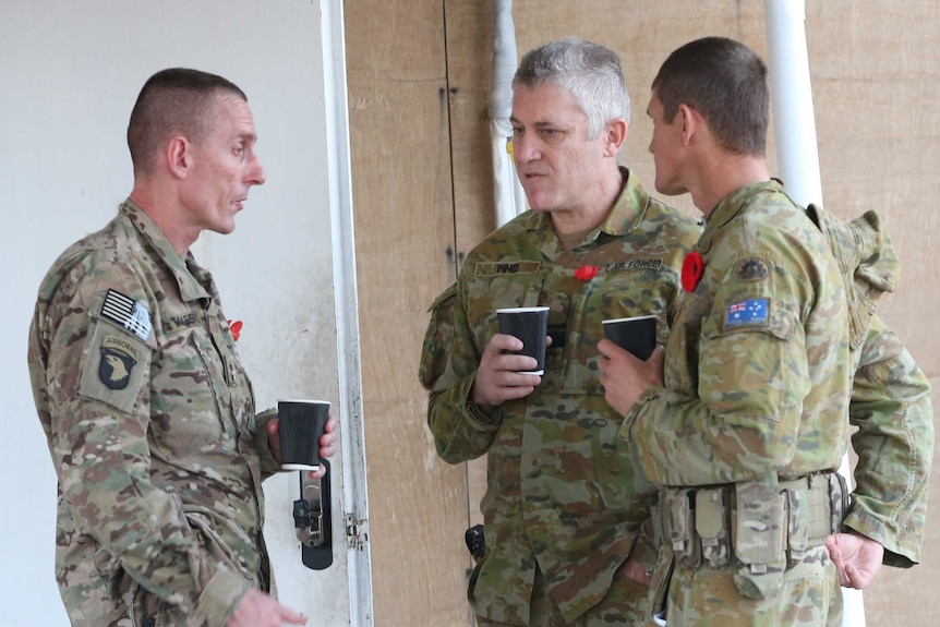 Air Vice Marshal Tim Innes (C), Australian task force commander Colonel Gavin Keating  (R) and the US Major General Gary J.Volesky (L)