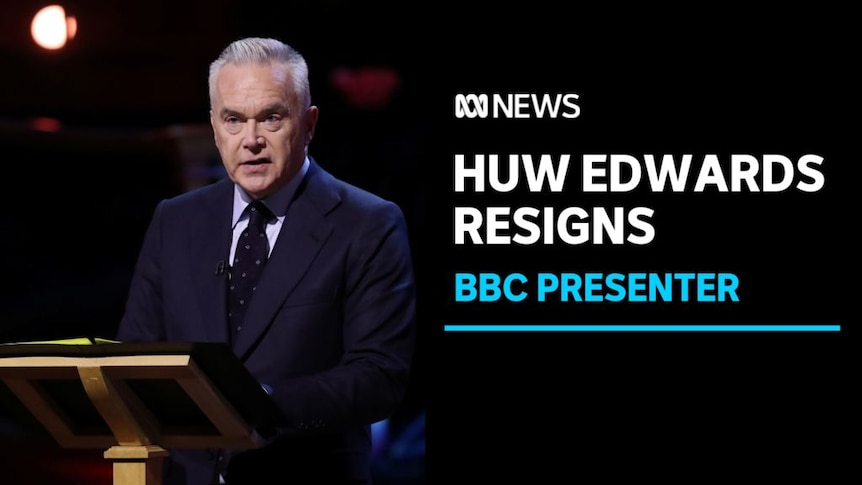 Huw Edwards resigns: BBC Presenter: A picture of a man wearing a suit with short grey hair speaking at a lectern.