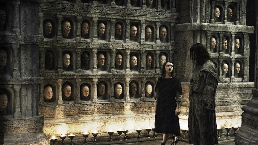 A still from HBO's Game of Thrones showing the Hall of Faces