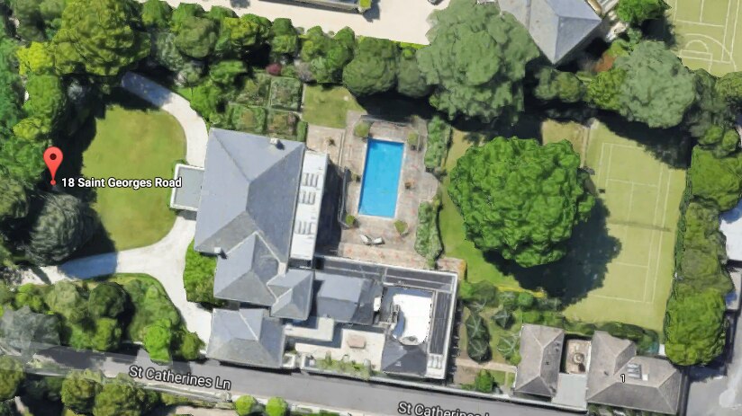 An aerial view of 18 St Georges Road in Toorak, showing a pool and a huge house.