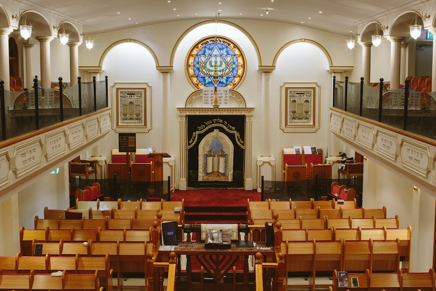 Inside of Sydney's Sephardi Synagogue, which features a stained glass window.