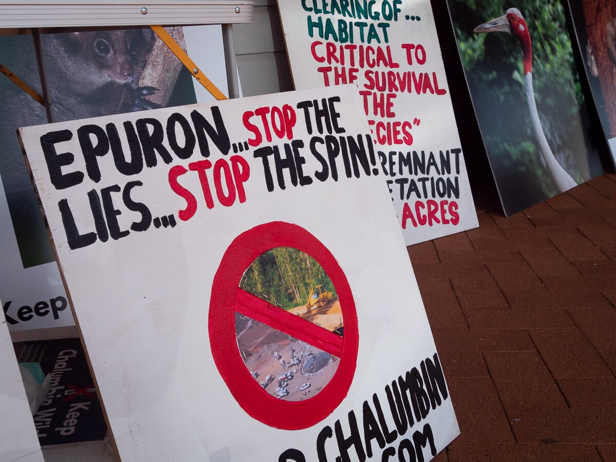 protest signs against wind farms