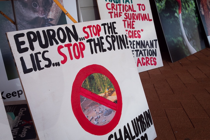 protest signs against wind farms