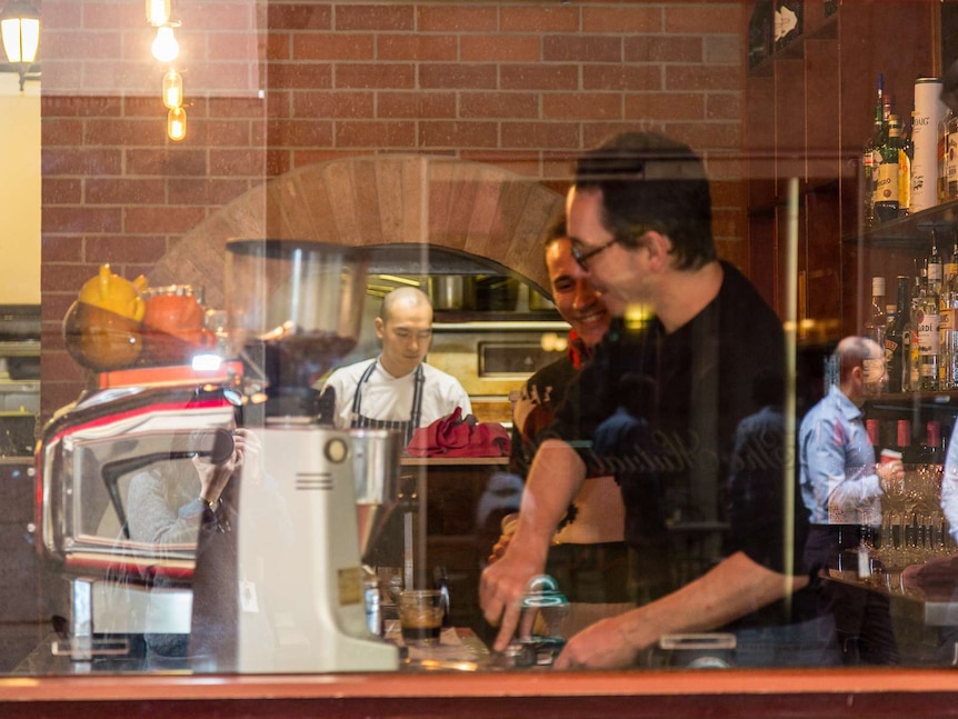 Baristas at work in a Melbourne cafe
