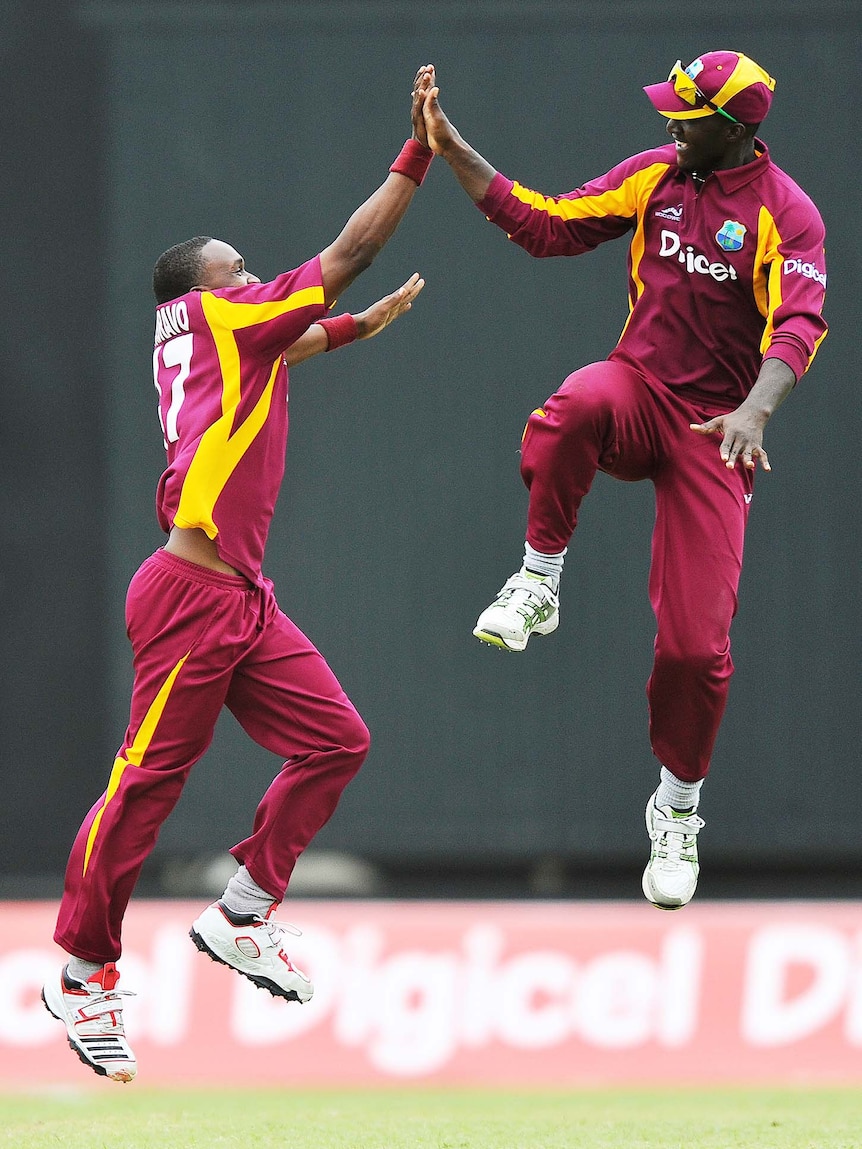 Party time ... the Windies cruised to a five-wicket win over Australia