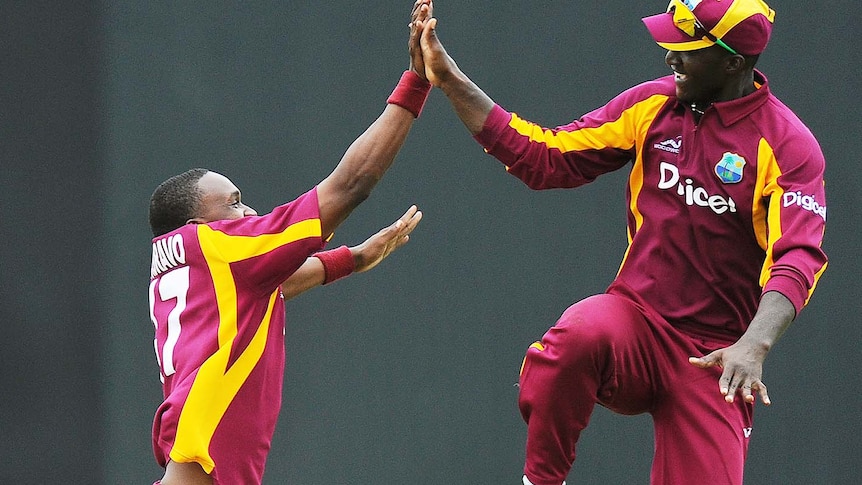 Party time ... the Windies cruised to a five-wicket win over Australia