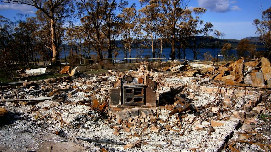 The remnants of a building destroyed by fire.