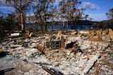 The remnants of a building destroyed by fire.