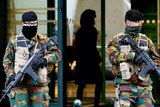Belgian soldiers stand guard outside Brussels hotel