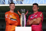 Perth Scorchers captain Ashton Turner and Sydney Sixers captain Moises Henriques pose during the BBL Final trophy