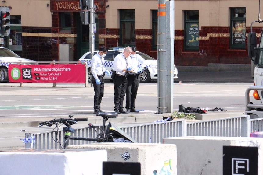 Police officers at the scene of a major security scare in Melbourne's CBD.