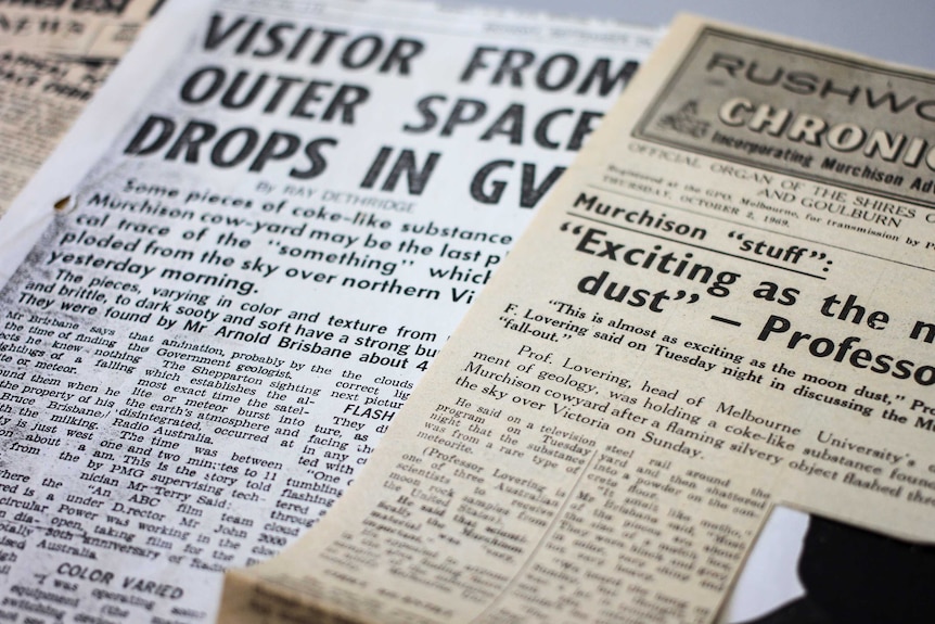 Newspaper clippings including the headline "Visitor from outer space drops in GV".