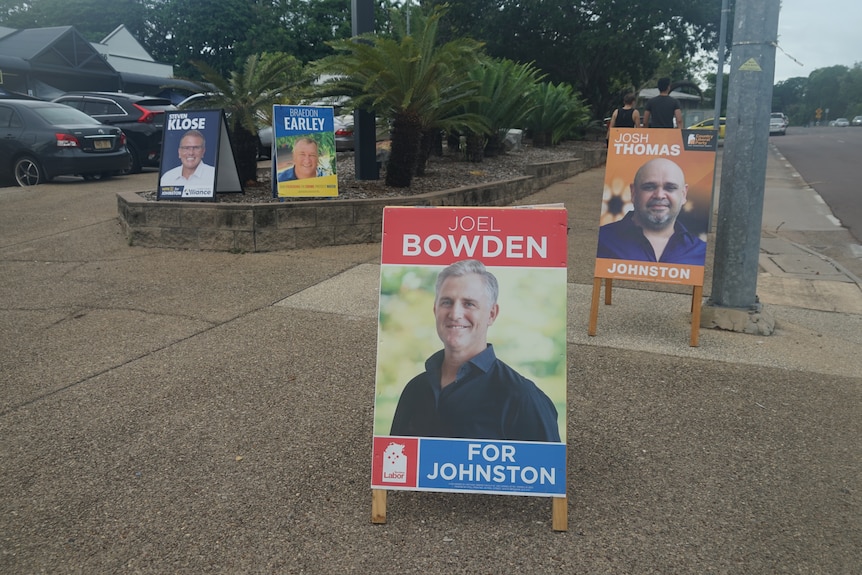 A collection of election signs for the NT's Johnston by-election