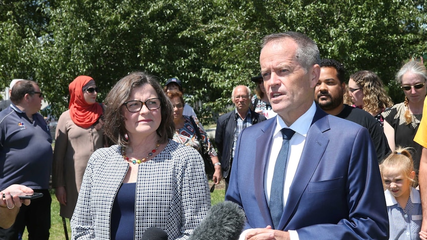 Labor leader Bill Shorten and Ged Kearney stand at a press conference in Preston.
