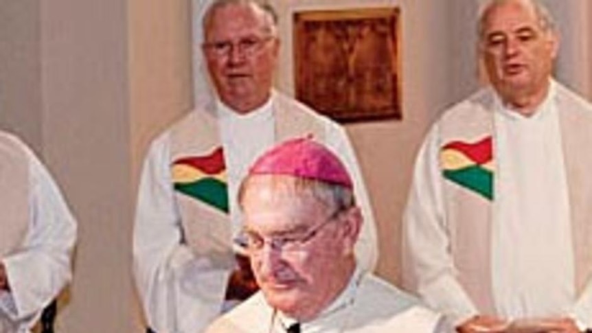 Five years ago, Bishop Morris (foreground) suggested women and married men could be considered for the priesthood.