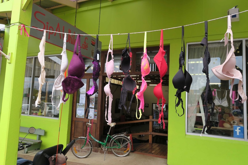 Bras have been made into bunting on shopfronts in Dorrigo as part of Breast Cancer Awareness month.