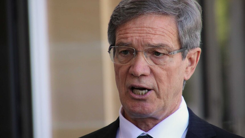 A tight head shot of WA Opposition Leader Mike Nahan talking.