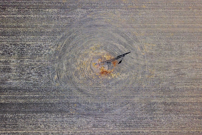 Patterns can be seen in a drought-effected paddock created by a plough.