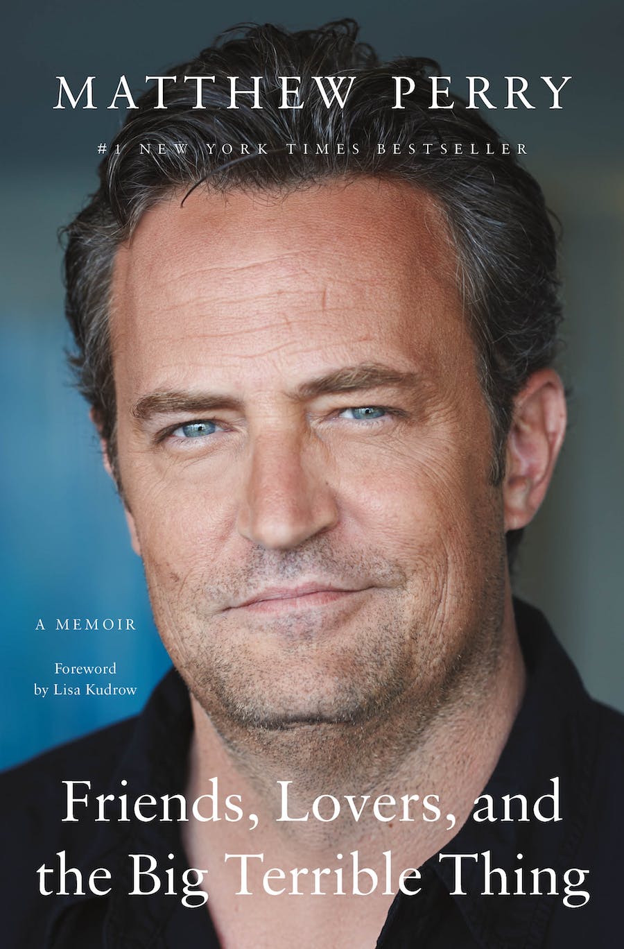 Book cover of Friends, Lovers and the Big Terrible Thing with a half smiling Matthew Perry portrait on the cover