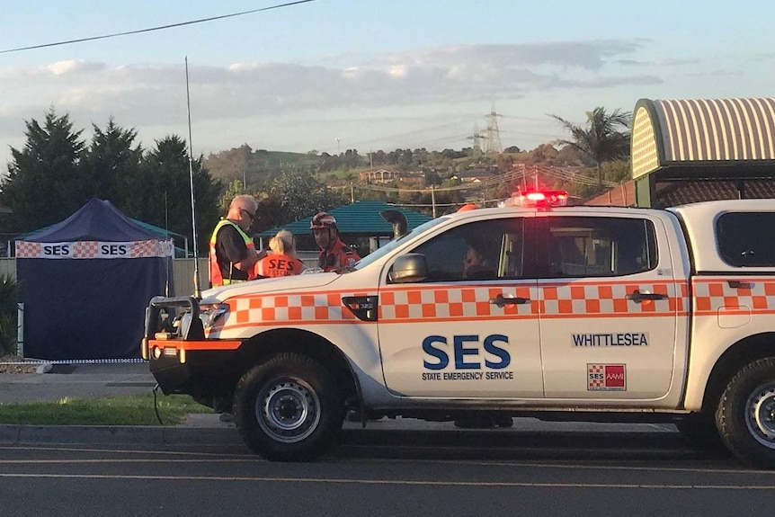 Police and SES vehicles at the scene outside the childcare centre.