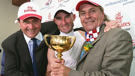 Lee Freedman, Glen Boss and Tony Santic celebrate Makybe Diva's Melbourne Cup success in 2005.