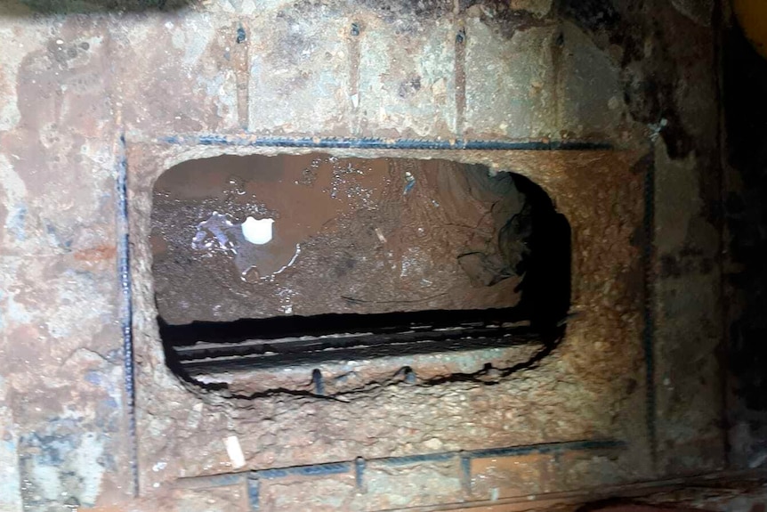 An image of the hole under the sink used in the Israeli prisonbreak