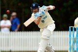 Michael Clarke bats for New South Wales in the Shield game against Queensland in Brisbane.