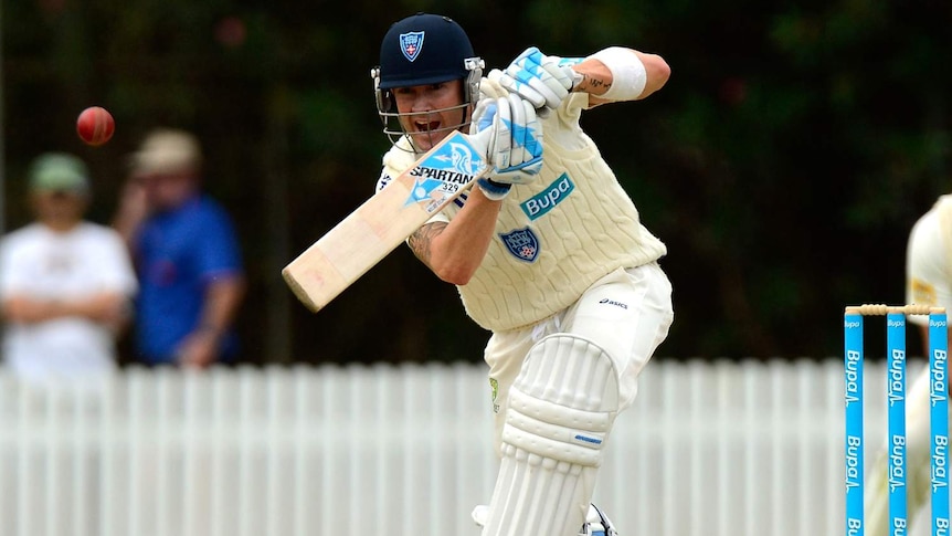 Michael Clarke bats for New South Wales in the Shield game against Queensland in Brisbane.