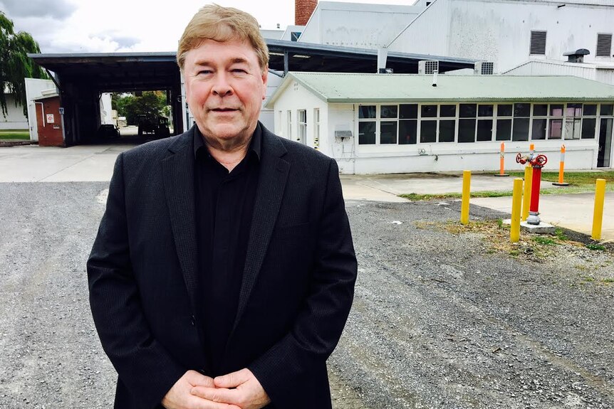 The Viplus Dairy CEO Peter Cunningham stands in front of his factory at Toora in South Gippsland, Victoria.