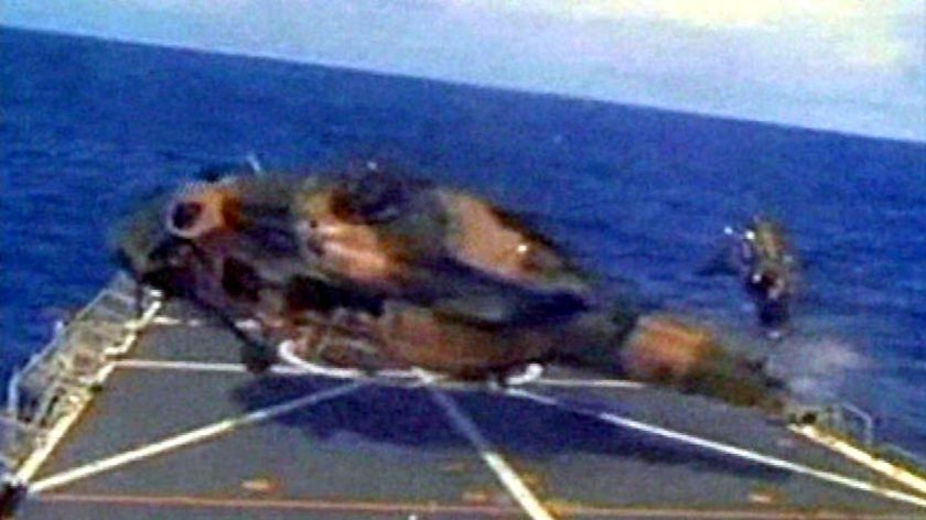 Moment of impact: The Black Hawk hits the landing deck of HMAS Kanimbla